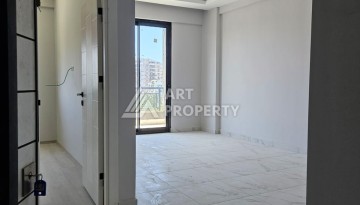 Южная квартира 1+1 в центре Авсаллара, новая резиденция, 55 кв.м. - Ракурс 8