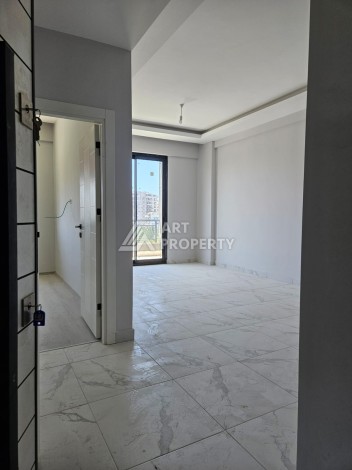 Южная квартира 1+1 в центре Авсаллара, новая резиденция, 55 кв.м. - Ракурс 7