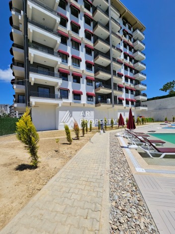 Южная квартира 1+1 в центре Авсаллара, новая резиденция, 55 кв.м. - Ракурс 8