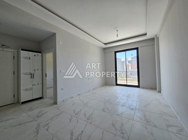 Южная квартира 1+1 в центре Авсаллара, новая резиденция, 55 кв.м. - Ракурс 9