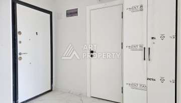 Южная квартира 1+1 в центре Авсаллара, новая резиденция, 55 кв.м. - Ракурс 11