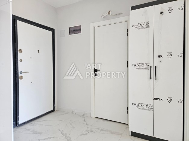 Южная квартира 1+1 в центре Авсаллара, новая резиденция, 55 кв.м. - Ракурс 10