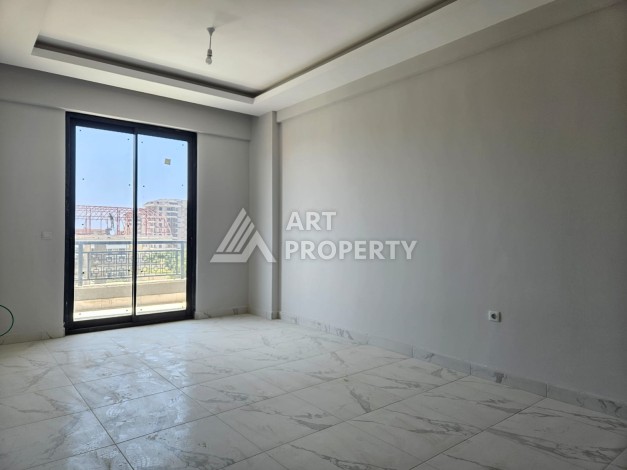 Южная квартира 1+1 в центре Авсаллара, новая резиденция, 55 кв.м. - Ракурс 11