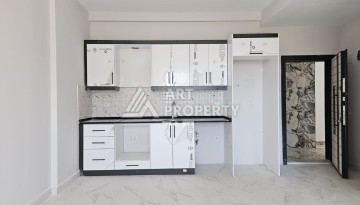 Южная квартира 1+1 в центре Авсаллара, новая резиденция, 55 кв.м. - Ракурс 13