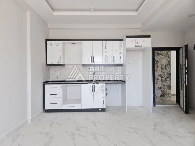 Южная квартира 1+1 в центре Авсаллара, новая резиденция, 55 кв.м. - Ракурс 12