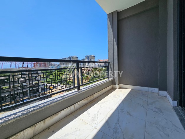 Южная квартира 1+1 в центре Авсаллара, новая резиденция, 55 кв.м. - Ракурс 16