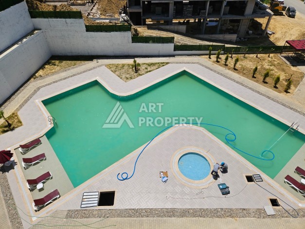 Южная квартира 1+1 в центре Авсаллара, новая резиденция, 55 кв.м. - Ракурс 17