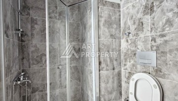 Южная квартира 1+1 в центре Авсаллара, новая резиденция, 55 кв.м. - Ракурс 19