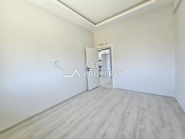 Южная квартира 1+1 в центре Авсаллара, новая резиденция, 55 кв.м. - Ракурс 21