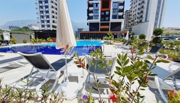 Готовые квартиры с рассрочкой, 1+1 в центре Махмутлара, 49 кв.м. - Ракурс 3