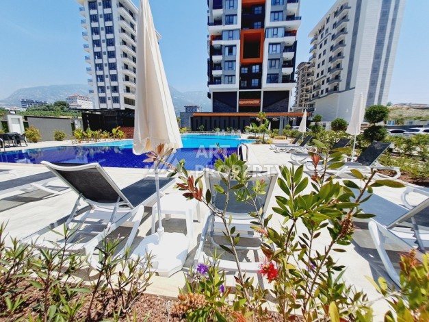 Готовые квартиры с рассрочкой, 1+1 в центре Махмутлара, 49 кв.м. - Ракурс 2