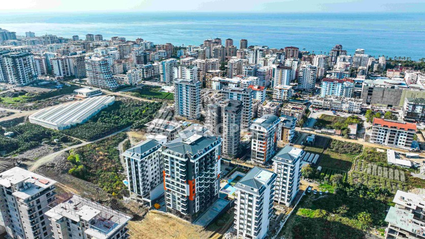 Готовые квартиры с рассрочкой, 1+1 в центре Махмутлара, 49 кв.м. - Ракурс 3