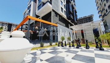 Готовые квартиры с рассрочкой, 1+1 в центре Махмутлара, 49 кв.м. - Ракурс 15