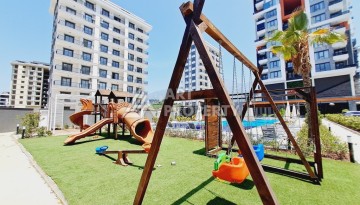 Готовые квартиры с рассрочкой, 1+1 в центре Махмутлара, 49 кв.м. - Ракурс 18