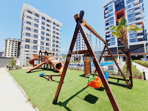 Готовые квартиры с рассрочкой, 1+1 в центре Махмутлара, 49 кв.м. - Ракурс 17