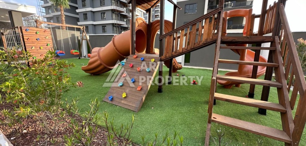 Готовые квартиры с рассрочкой, 1+1 в центре Махмутлара, 49 кв.м. - Ракурс 21