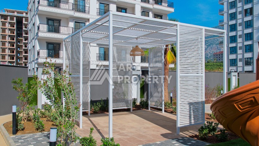 Готовые квартиры с рассрочкой, 1+1 в центре Махмутлара, 49 кв.м. - Ракурс 24