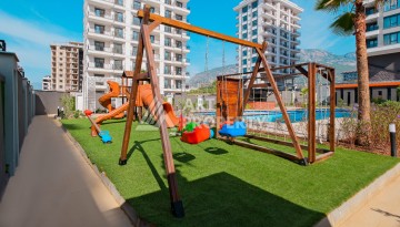 Готовые квартиры с рассрочкой, 1+1 в центре Махмутлара, 49 кв.м. - Ракурс 26
