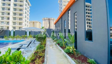 Готовые квартиры с рассрочкой, 1+1 в центре Махмутлара, 49 кв.м. - Ракурс 36