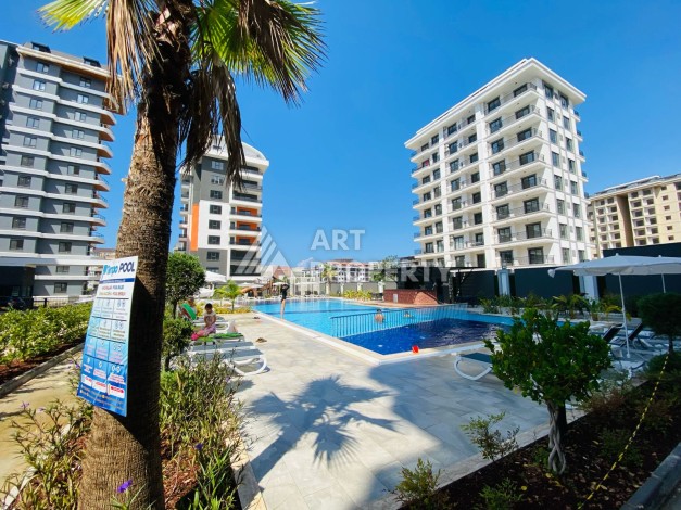 Готовые квартиры с рассрочкой, 1+1 в центре Махмутлара, 49 кв.м. - Ракурс 39