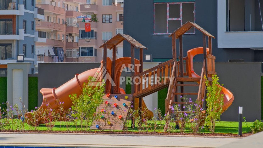 Готовые квартиры с рассрочкой, 1+1 в центре Махмутлара, 49 кв.м. - Ракурс 43