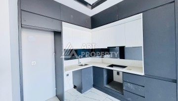 Готовые квартиры с рассрочкой, 1+1 в центре Махмутлара, 49 кв.м. - Ракурс 46