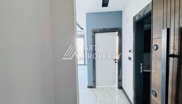 Готовые квартиры с рассрочкой, 1+1 в центре Махмутлара, 49 кв.м. - Ракурс 48