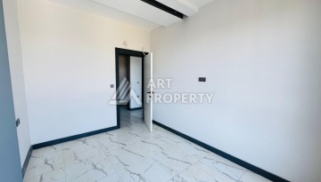 Готовые квартиры с рассрочкой, 1+1 в центре Махмутлара, 49 кв.м. - Ракурс 49