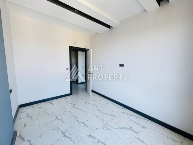 Готовые квартиры с рассрочкой, 1+1 в центре Махмутлара, 49 кв.м. - Ракурс 48