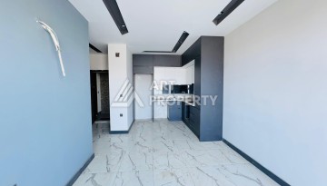 Готовые квартиры с рассрочкой, 1+1 в центре Махмутлара, 49 кв.м. - Ракурс 50