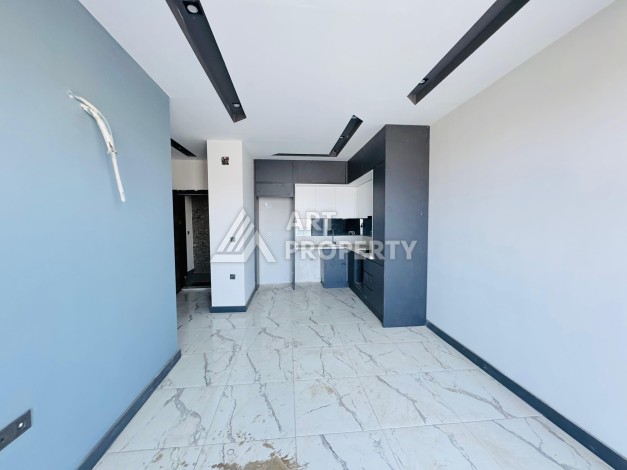 Готовые квартиры с рассрочкой, 1+1 в центре Махмутлара, 49 кв.м. - Ракурс 49