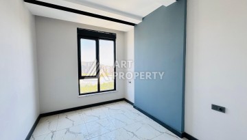 Готовые квартиры с рассрочкой, 1+1 в центре Махмутлара, 49 кв.м. - Ракурс 51