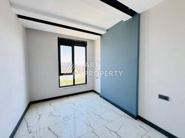 Готовые квартиры с рассрочкой, 1+1 в центре Махмутлара, 49 кв.м. - Ракурс 50