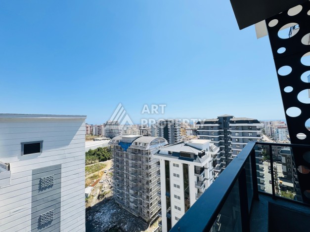 Готовые квартиры с рассрочкой, 1+1 в центре Махмутлара, 49 кв.м. - Ракурс 51