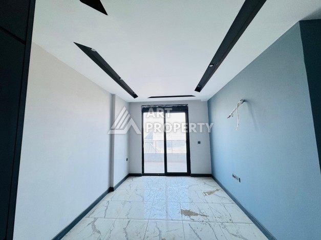 Готовые квартиры с рассрочкой, 1+1 в центре Махмутлара, 49 кв.м. - Ракурс 52