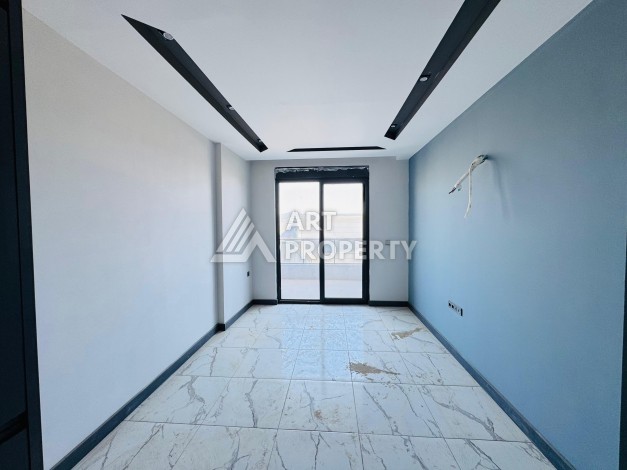 Готовые квартиры с рассрочкой, 1+1 в центре Махмутлара, 49 кв.м. - Ракурс 53