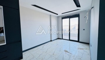 Готовые квартиры с рассрочкой, 1+1 в центре Махмутлара, 49 кв.м. - Ракурс 56