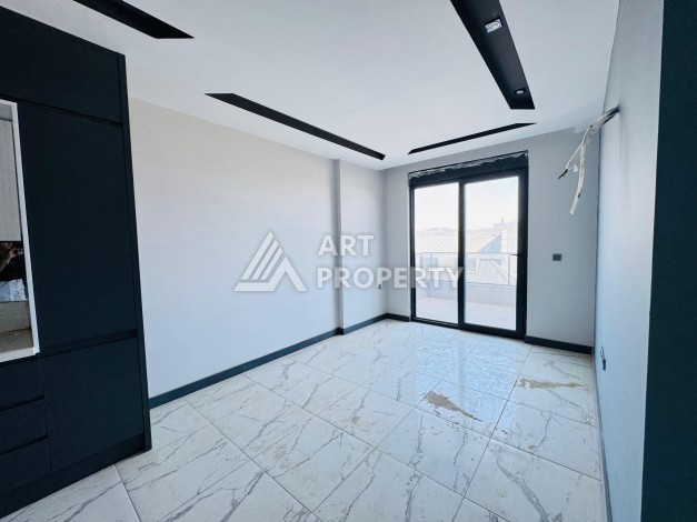 Готовые квартиры с рассрочкой, 1+1 в центре Махмутлара, 49 кв.м. - Ракурс 55