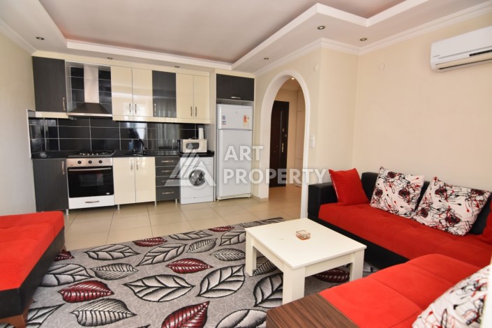 Просторная квартира 1+1 в 150 метрах от моря в Махмутларе - Ракурс 2