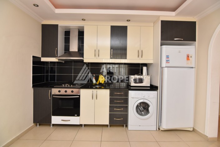 Просторная квартира 1+1 в 150 метрах от моря в Махмутларе - Ракурс 10