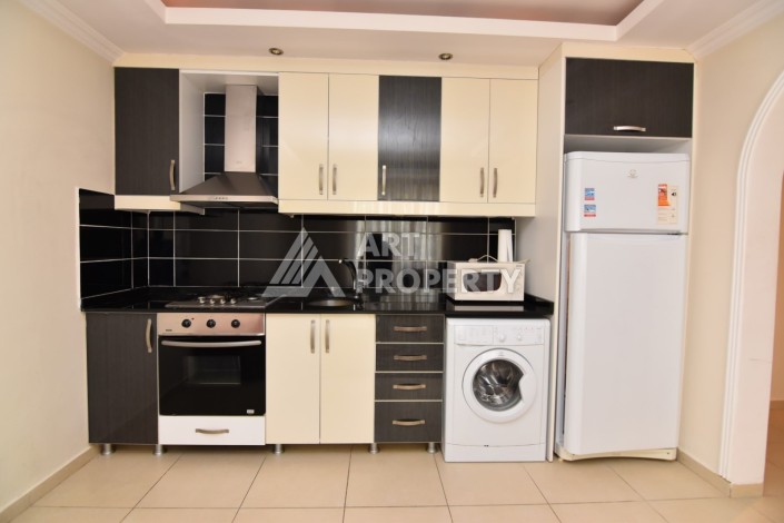 Просторная квартира 1+1 в 150 метрах от моря в Махмутларе - Ракурс 12