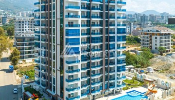 Стильная квартира 1+1 для отдыха и аренды, 500 м от моря в центре Махмутлара - Ракурс 1