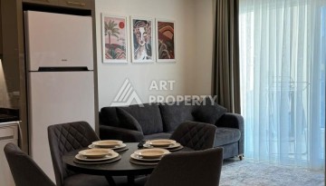 Стильная квартира 1+1 для отдыха и аренды, 500 м от моря в центре Махмутлара - Ракурс 3