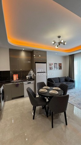 Стильная квартира 1+1 для отдыха и аренды, 500 м от моря в центре Махмутлара - Ракурс 3