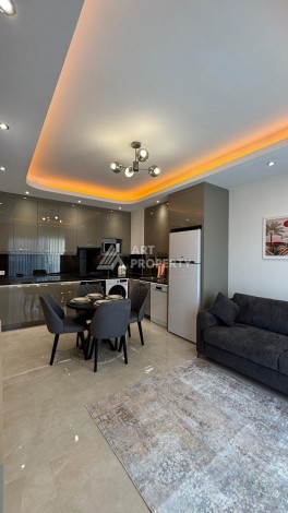 Стильная квартира 1+1 для отдыха и аренды, 500 м от моря в центре Махмутлара - Ракурс 4