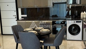 Стильная квартира 1+1 для отдыха и аренды, 500 м от моря в центре Махмутлара - Ракурс 6