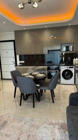 Стильная квартира 1+1 для отдыха и аренды, 500 м от моря в центре Махмутлара - Ракурс 5