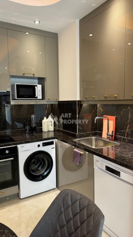 Стильная квартира 1+1 для отдыха и аренды, 500 м от моря в центре Махмутлара - Ракурс 11