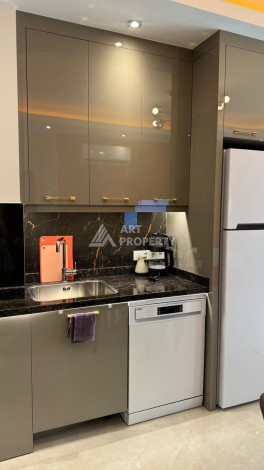 Стильная квартира 1+1 для отдыха и аренды, 500 м от моря в центре Махмутлара - Ракурс 12