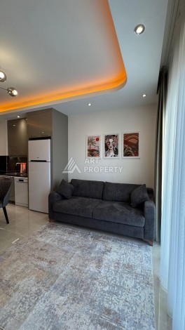 Стильная квартира 1+1 для отдыха и аренды, 500 м от моря в центре Махмутлара - Ракурс 13